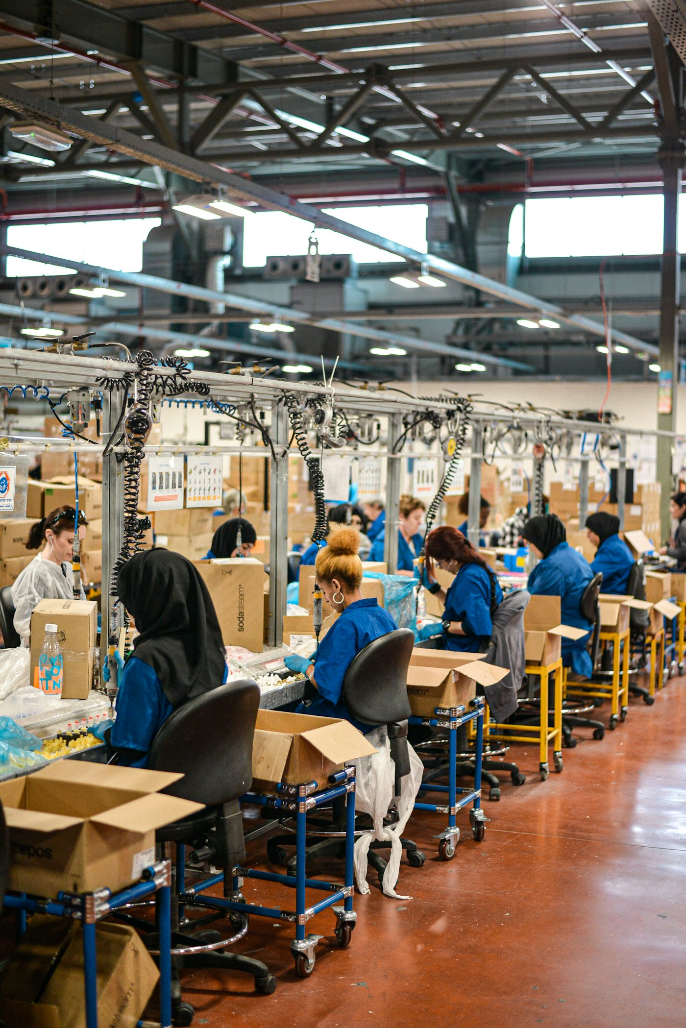 Industrial production team at work in a manufacturing plant