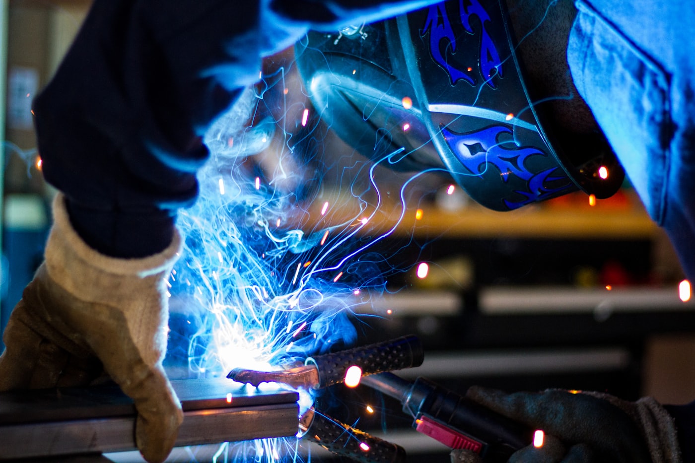 Certified welder working on a metal structure